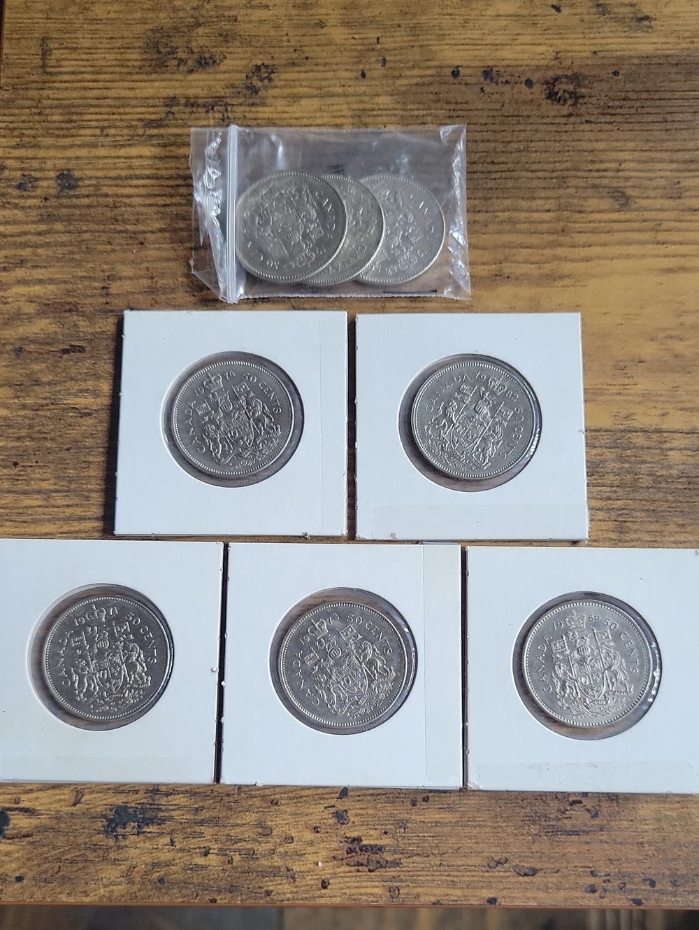 Vintage 1970s/80s Canadian 50 Cent Silver Coins in White Holders - Set of 8